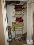 Closet Contents - Decorative Pillows, Outdoor Cushions, and Lot of Cookbooks