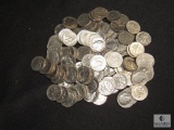 Approximately half of a pound of assorted dimes