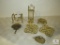 Lot assorted brass trivets, Candle Holder, and Shell & Leaf Tray