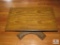 Vintage laminated wood coffee table on casters