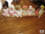 Wooden Bench with 8 Vintage Baby Dolls