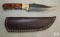 D2 stainless cutom fixed blade skinner with leather sheaath