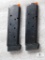 Two 1911 .45 acp pistol mags with bumper pads