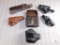 Assortment of leather holsters and accessories