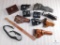Assortment of leather holsters and accessories