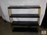 Vintage Tin 4 Tier Shelf Black and Gold in color
