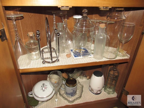 Kitchen Cabinet Contents: Napkin Holder, Wine Bottle, Assorted Glass Bottles, Jars, Wine Glasses,
