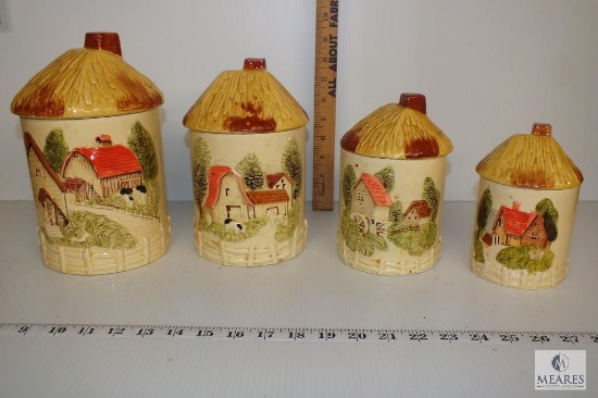 Vintage, retro ceramic canister set with orange thatched roof lid, cows, barns / farm scene canister