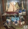 Shelf Lot of Lighthouse and Boat Captain Decorations Figurines, Candle Holders, Vases, and Plate