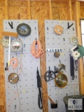 Wall Contents Saw Blades, Rope, Grinder Wheels and Hand Seeder