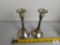 Set of two Sterling candlesticks