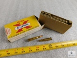 8 Rounds 25-35 ammo and 12 rounds brass