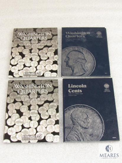 Four empty coin folders