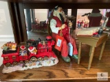 Lot of Two Decorative Items - Santa at Desk and Holiday Train