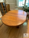 Single Pedestal Dining Table with Claw Feet and Two Leaves