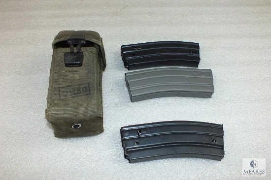 Three 30 round AR 15 5.56 rifle magazines in a carrying case