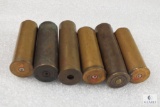 6 .12 gauge brass shells