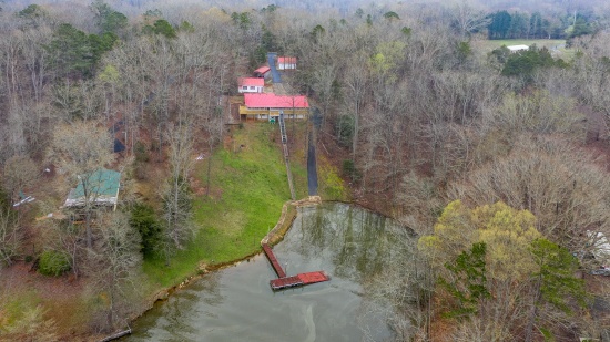 Absolute Auction:  Docked Lake Secession Home