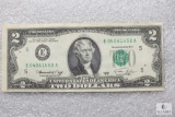 Series 1976 US $2 small size note - off-center cut