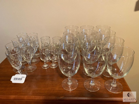 Twenty-Five Pieces of Mixed Clear Glass Drinkware