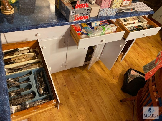 Contents of Kitchen Drawers Around Island