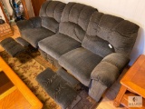 Upholstered Sofa with Reclining End Seats