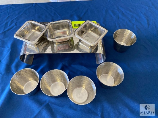 Serving Lot of mixed sauce cups and hammered display board