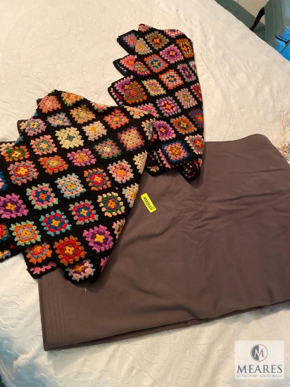 Lot of afghans and blanket