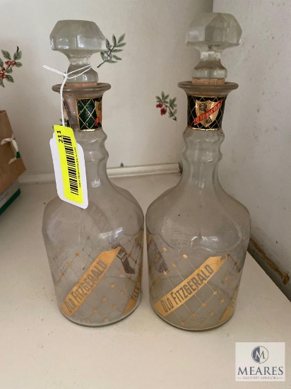 Two empty Old Fitzgerald bourbon bottles