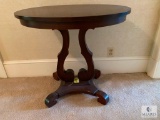 Mahogany lyre-style oval top table