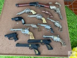 Large lot of child's cap guns and play pistols