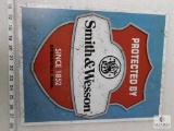 Smith and Wesson tin advertising sign