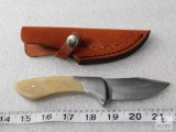 New fixed blade stainless skinner with bone handle and leather sheath