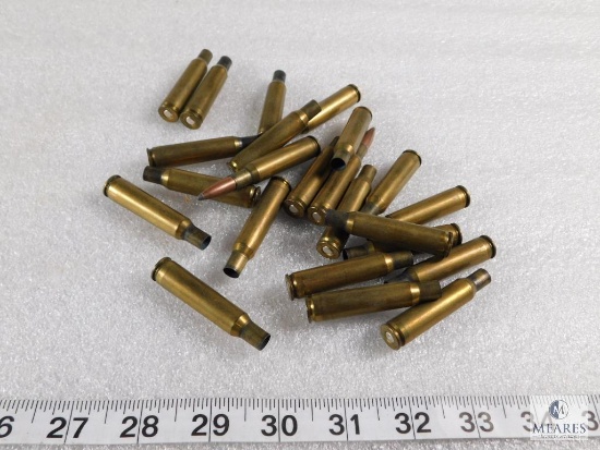 Lot of (22) 7mm Brass for Reloading and 1 Live Round