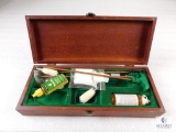 Gun cleaning kit in wooden storage box