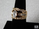 Ladies Costume Ring size 7 gold tone band with clear rhinestones