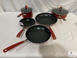 Two Sur la Table Pots with Lids and Three KitchenAid Frying Pans
