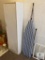 White One-Door Cabinet and Vintage Ironing Board