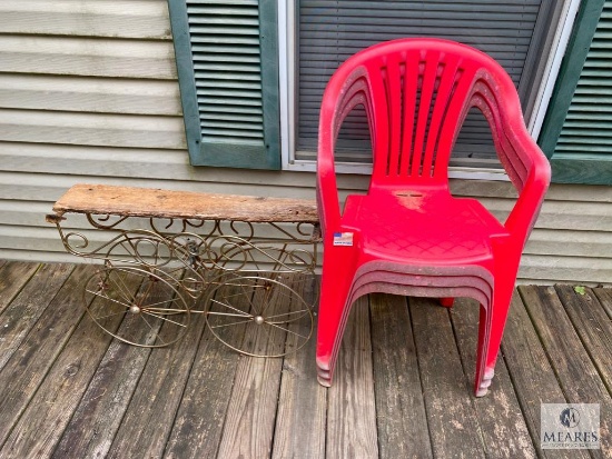 Three Plastic Patio Chairs, Metal Plant Stand, Weathervane, and Two Windchimes