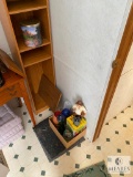 Tall Storage Shelf with Gardening Items