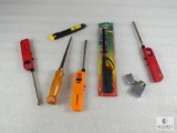 Lot - Zippo Lighter, Assorted Grill Lighters, Razor and Hand-held Saw