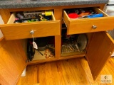 Contents of the Drawers and Lower Cabinets in the Kitchen