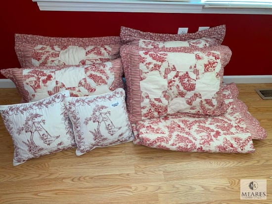 Red and White Patterned Pillows and Bedcover