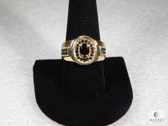 Gold Tone Ring With Black Stones
