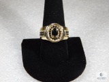 Gold Tone Ring With Black Stones