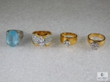 Lot Of Four Gold Plated Rings With Stones.