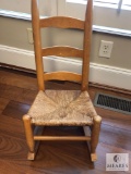 Child's Wood Ladder Back Rattan Bottom Rocking Chair and Stuffed Animal Dog