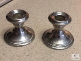 Pair of N.S. Cu. Weighted Sterling Silver Candle Stick Holders