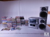 Stereo with Speakers and LARGE Lot of CDs