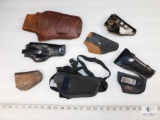 6 Leather Holsters And 1 Nylon Shoulder Holster 8 total pieces